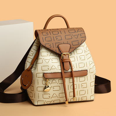 Ženski mali ruksak od eko kože s printom i džepom