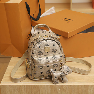 Új modell kis női bőr hátizsák fém emblémával