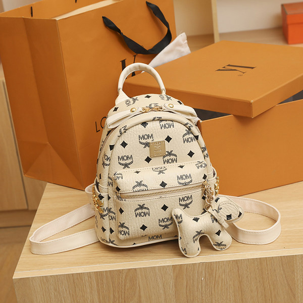 Új modell kis női bőr hátizsák fém emblémával