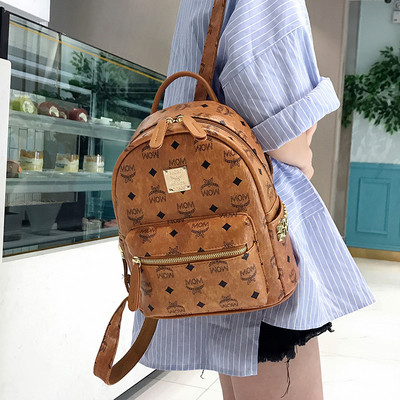 Új modell női bőr hátizsák fém emblémával