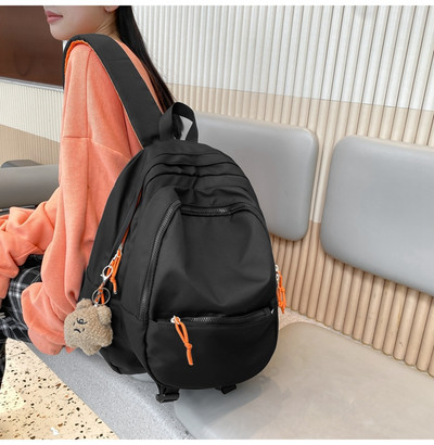 Tekstila mugursoma sievietēm ar atslēgu piekariņu rotājumu