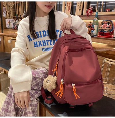 Tekstila mugursoma sievietēm ar atslēgu piekariņu rotājumu