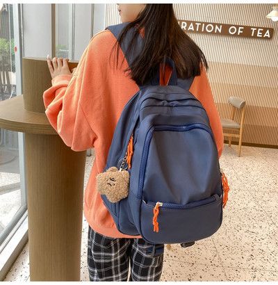 Tekstila mugursoma sievietēm ar atslēgu piekariņu rotājumu