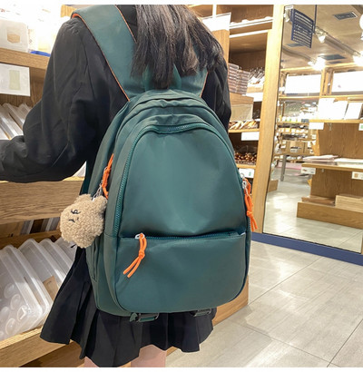 Tekstila mugursoma sievietēm ar atslēgu piekariņu rotājumu