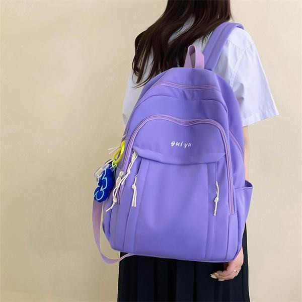 Női textil hátizsák kulcstartóval