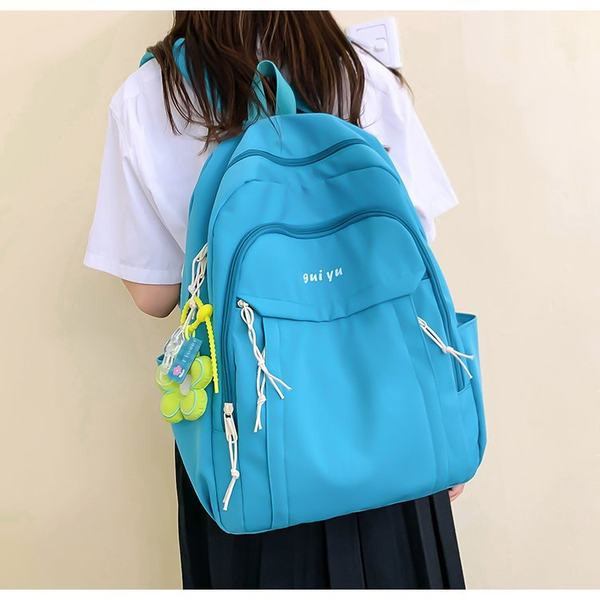 Női textil hátizsák kulcstartóval