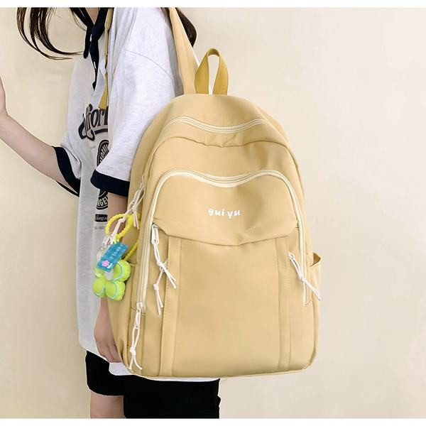 Női textil hátizsák kulcstartóval