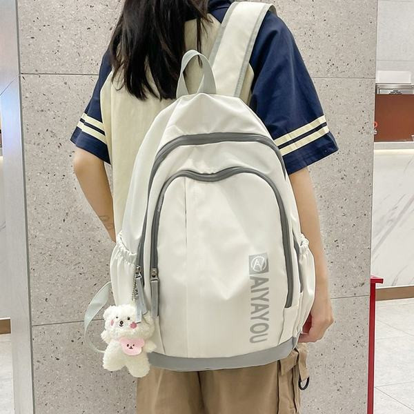 Γυναικείο υφασμάτινο σακίδιο πλάτης με επιγραφή