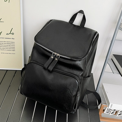 Μοντέρνο δερμάτινο σακίδιο πλάτης με μπροστινή τσέπη για γυναίκες