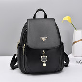 Ženski ruksak sa metalnim privjeskom u tri boje