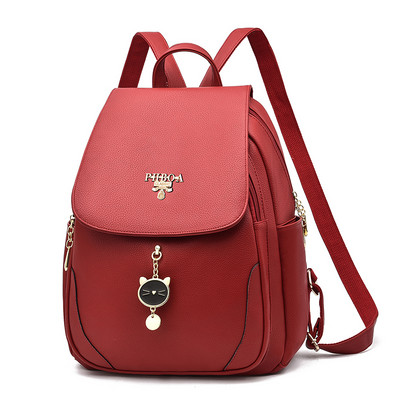 Ženski ruksak sa metalnim privjeskom u tri boje