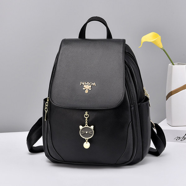 Ženski ruksak sa metalnim privjeskom u tri boje