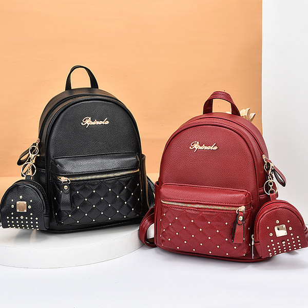 Moderan ženski ruksak na metalne karove