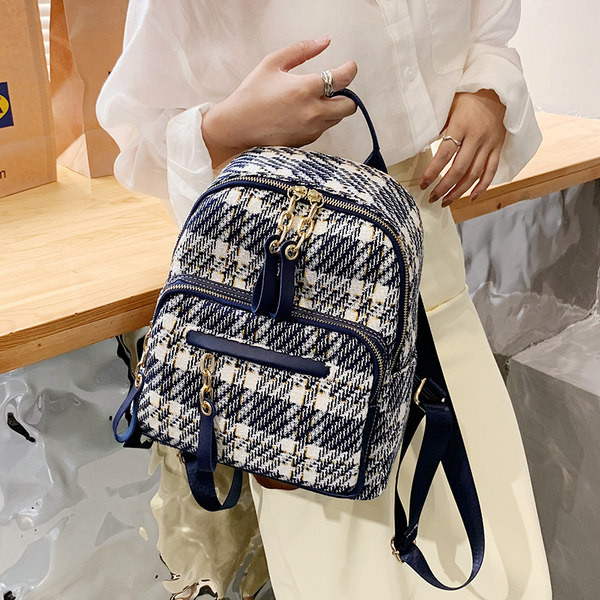 Rūtaina sieviešu mugursoma ar kabatu un rāvējslēdzēju