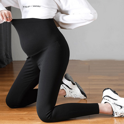 Sieviešu elastīgie legingi pelēkā un melnā krāsā grūtniecēm