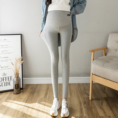 Elastīgi grūtnieču logo legingi ar augstu vidukli