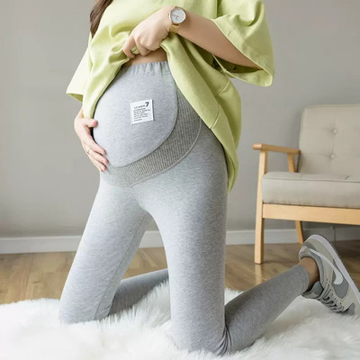 Sieviešu legingi grūtniecēm - ar platu jostu