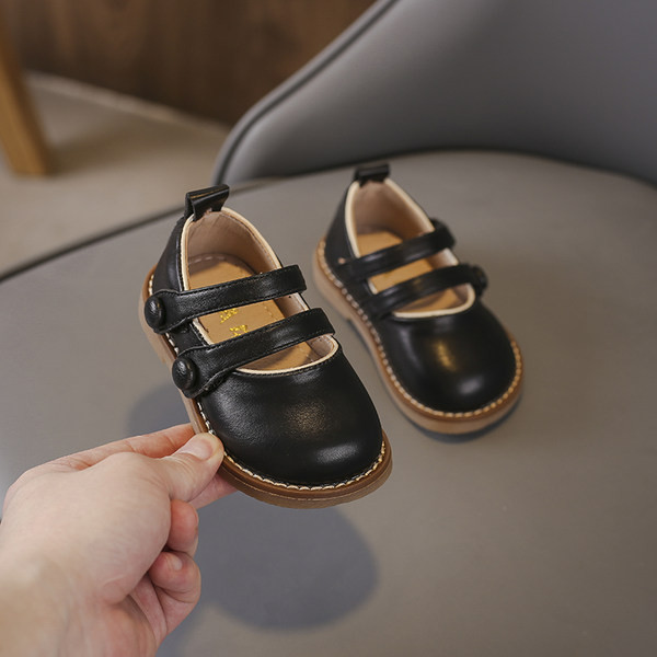 Bērnu ādas apavi melnā un bēšā krāsā