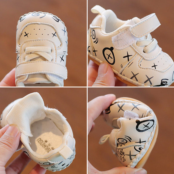 Öko bőrből készült babacipő tépőzáras foltokkal és fűzőkkel