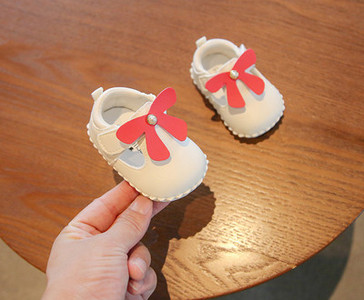 Bērnu bikses meitenēm no eko ādas ar lenti un pērlēm