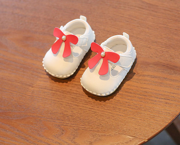 Bērnu bikses meitenēm no eko ādas ar lenti un pērlēm