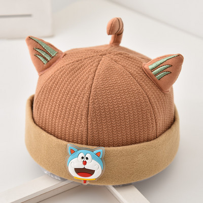 Bērnu cepure ar ausīm un izšuvumiem