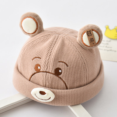 Bērnu cepure ar ausīm un izšuvumiem