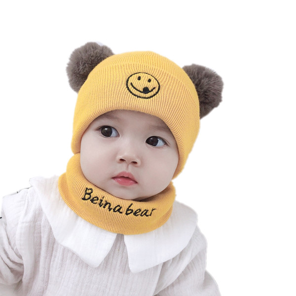 Őszi-téli kötött baba sapka pomponokkal