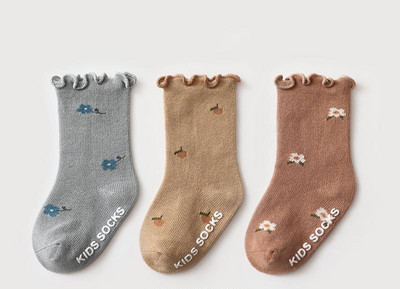 Zīdaiņu zeķītes ar ziedu motīviem