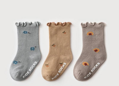 Zīdaiņu zeķītes ar ziedu motīviem