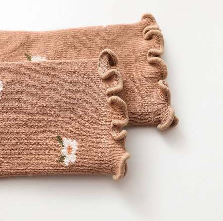 Zīdaiņu zeķītes ar ziedu motīviem