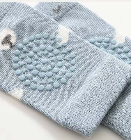 Βρεφικό σετ αντιολισθητικές κάλτσες και κορδέλα για τα γόνατα