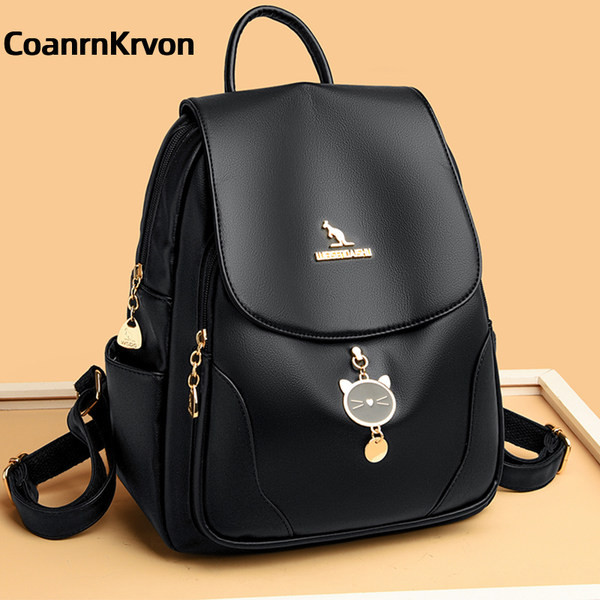 Γυναικείο σακίδιο πλάτης με μεταλλικό μενταγιόν