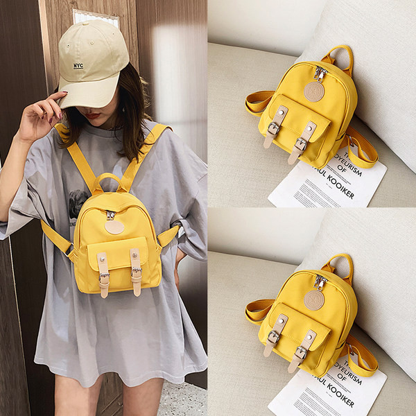 Neformāla maza mugursoma ar sprādzi un ārējo kabatu