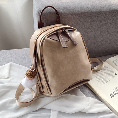 Mali ženski ruksak s patentnim zatvaračem