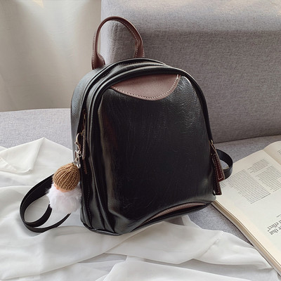 Mali ženski ruksak s patentnim zatvaračem