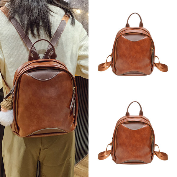 Mali ženski ruksak s patentnim zatvaračem