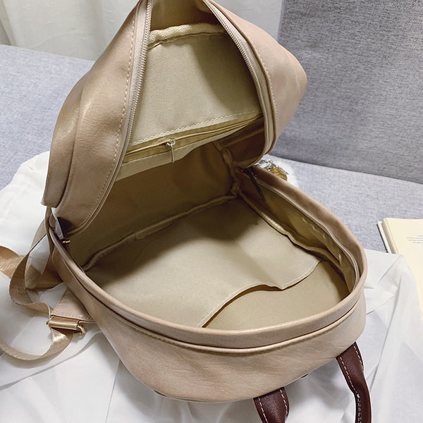 Mali ženski ruksak s patentnim zatvaračem