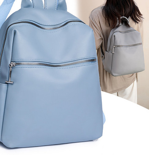 Sieviešu mugursoma ar kabatu un rāvējslēdzēju