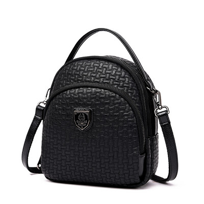 Női hátizsák fém díszítéssel