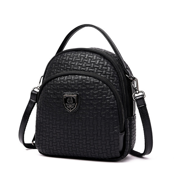 Női hátizsák fém díszítéssel