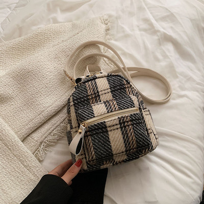 Tekstila rudens-ziemas mugursoma ar ārējo kabatu