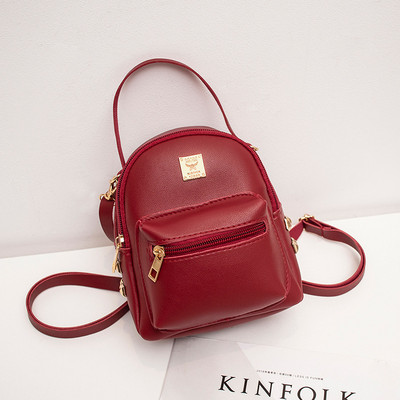 Sieviešu ādas mugursoma - ar gariem rokturiem