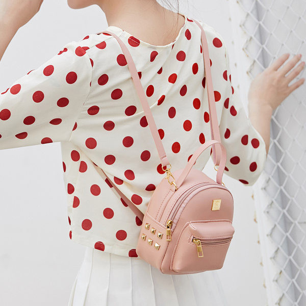 Sieviešu ādas mugursoma - ar gariem rokturiem