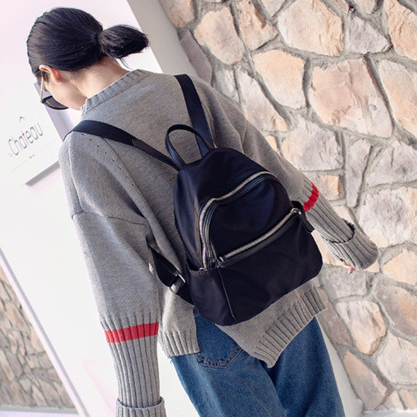 Textil női hátizsák külső zsebbel