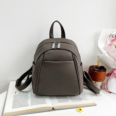 Sieviešu maza eko ādas mugursoma ar rāvējslēdzēju un kabatu