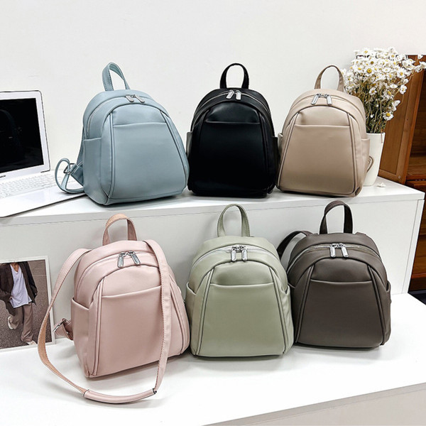 Sieviešu maza eko ādas mugursoma ar rāvējslēdzēju un kabatu