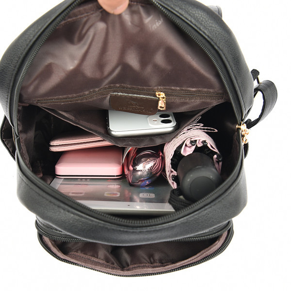 Modes eko ādas mugursoma ar metāla elementu sievietēm