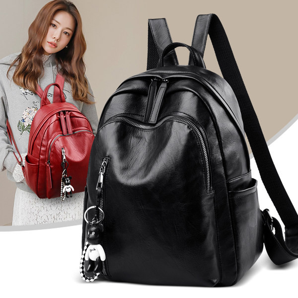 Tīra sieviešu mugursoma ar atslēgu piekariņu