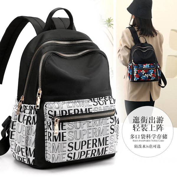 Sieviešu tekstila mugursoma ar ārējo kabatu